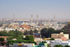 Nouakchott, Mauritania: skyline of the sprawling Moor capital with the Olympic Stadium and theMinistry of Foreign Affairs on the horizon - photo by M.Torres