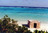 Midway Atoll: Remnants of World War II - a pill box on the beach the emerald waters of the Pacific Ocean - photo by G.Frysinger