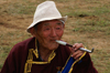 Ulan Bator / Ulaanbaatar, Mongolia: Naadam festival - Mongolian man smoking a pipe - horse races - Hui Doloon Khutag - photo by A.Ferrari