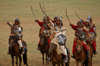 Ulan Bator / Ulaanbaatar, Mongolia: cavalry charge to celebrate the 800th anniversary of the Mongolian state - sabres - photo by A.Ferrari