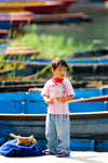 Pokhara, Nepal: boy on the banks of lake Phewa - photo by E.Petitalot