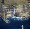 New Zealand - South island - Milford sound: Waterfall on Cascade Point - photo by Air West Coast