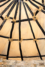 Orkney island - Skara Brae- a reconstructed roof over one of the stone age houses - photo by Carlton McEachern