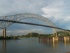 Panama Canal: Puente de las Americas - Bridge of the Americas - late afternoon - cantilever and tied arch design by Sverdrup and Parcel - photo by H.Olarte