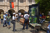 A group of people promote the natural beauty of the Portobelo area in the plaza in front of the Customs House - Portobello, Coln, Panama - photo by H.Olarte