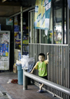 La Chorrera, Panama province: Chinese toddler at grocery shop - most grocery stores in Panama are owned and operated by the Chinese minority - photo by H.Olarte