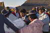 Lake Titicaca, Puno region, Peru: Aymara dancing around the newlyweds  Aymara wedding on the main floating island - photo by C.Lovell