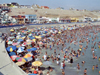 Lima, Peru: crowds at Punta Hermosa beach - photo by M.Bergsma