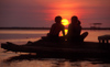 Philippines - Beach - the day concludes with a perfect sunset - watching the sunset from a platform over the water - vacations - resort life - photo by B.Henry