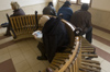 Poland - Krakow: commuters waiting inside the railway station - photo by M.Gunselman