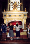 Iasi: Moldavian Metropolitan Cathedral - worshiping the coffin of St Paraschiva / St Friday - photo by M.Torres