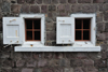 The Bottom, Saba: Sacred Heart Church - small windows on a stone wall - photo by M.Torres