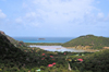 Anse de Grande Saline, St. Barts / Saint-Barthlemy: the old salt pans flanked by two high hills - Ile Coco in the distance - photo by M.Torres