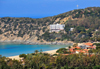 Solanas, Sinnai, Cagliari province, Sardinia / Sardegna / Sardigna: beach on the Golfo di Cagliari - cross and the environmentally incorrect religious rest house of La Scogliera - Spiaggia di Solanas - Campidano di Cagliari - photo by M.Torres