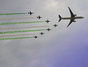 Riyadh, Saudi Arabia: Saudi Hawks aerobatic team flying BAE Hawk Mk.65 jet trainers flying in formation with a Saudi Arabian Airlines Boeing 777-368(ER) HZ-AK43 - Royal Saudi Air Force - photo by M.Torres