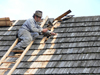 Slovakia - Ruzomberok - Vlkolinec village:repairing a wooden roof - UNESCO World Heritage site - Zilina district - photo by J.Kaman