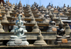 Colombo, Sri Lanka: Gangaramaya Temple - slope of Buddhas and stupas - Slave island - photo by M.Torres