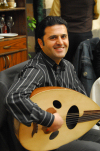 Damascus, Syria: singer playing Oud - the 'Oriental' - Syrian-Armenian restaurant - old town - photographer: M.Torres