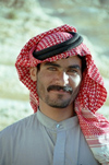 Palmyra, Syria: Arab man with Shemagh head scarf - photo by J.Kaman