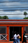 Scarborough, Tobago: red house and power lines - photo by E.Petitalot