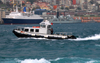 Istanbul, Turkey: Bosphorus and Beyoglu - Istanbul Modern - pilots' boat, the cruise ship Blue Monarch and the Royal Navy destroyer MS Exeter (D89) - photo by M.Torres