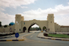 Al Ain / Al-Ayn, Abu Dhabi, UAE: city gate with mock defensive towers - photo by M.Torres