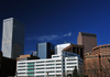 Denver, Colorado, USA: Denver Newspaper Agency Building and CBD skyscrapers seen from the Civic Center - architects Newman Cavender & Doane - Denver skyline - photo by M.Torres