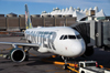 Denver, Colorado, USA: Denver International Airport - Frontier Airlines Airbus A319-112 N943FR, Deer Fawn 'Cloe' - CN 2518 - preparing for pushback - Concourse A, Gate A44 - Teflon-coated fiberglass tent roof of Jeppesen terminal in the background - photo by M.Torres