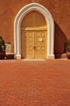 Socorro, New Mexico, USA: San Miguel Mission - main gate on an adobe facade - photo by M.Torres