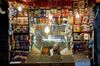 Sana'a / Sanaa, Yemen: Market stall at night - dry fruits, biscuits and sweets - photo by J.Pemberton