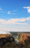 Victoria Falls, Matabeleland North, Zimbabwe: Victoria Falls Bridge over the gorge of the Zambezi River - border between Zimbabwe and Zambia - used for road, raill and pedestrian traffic - seen from the VF Hotel - photo by M.Torres