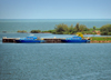 Entebbe, Wakiso District, Uganda: Uganda coast guard naval base on Lake Victoria - coastal defense craft on the pier, Marine Wing of the Uganda People's Defence Force (UPDF), navy of a landlocked country, Manyago area - photo by M.Torres