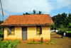 Entebbe, Wakiso District, Uganda: yellow house on Manyago Road, part of a development for civil servants - photo by M.Torres